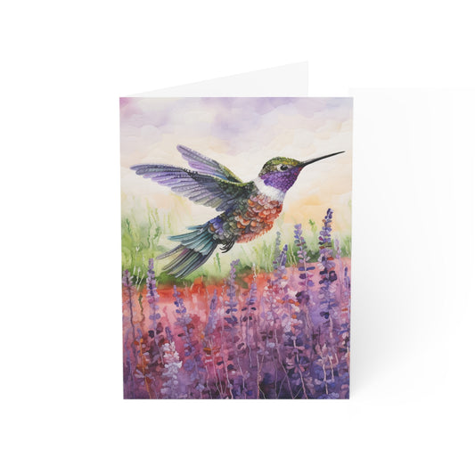 Threaded Wings: A humming's birds dance in a lavender field - Greeting Card